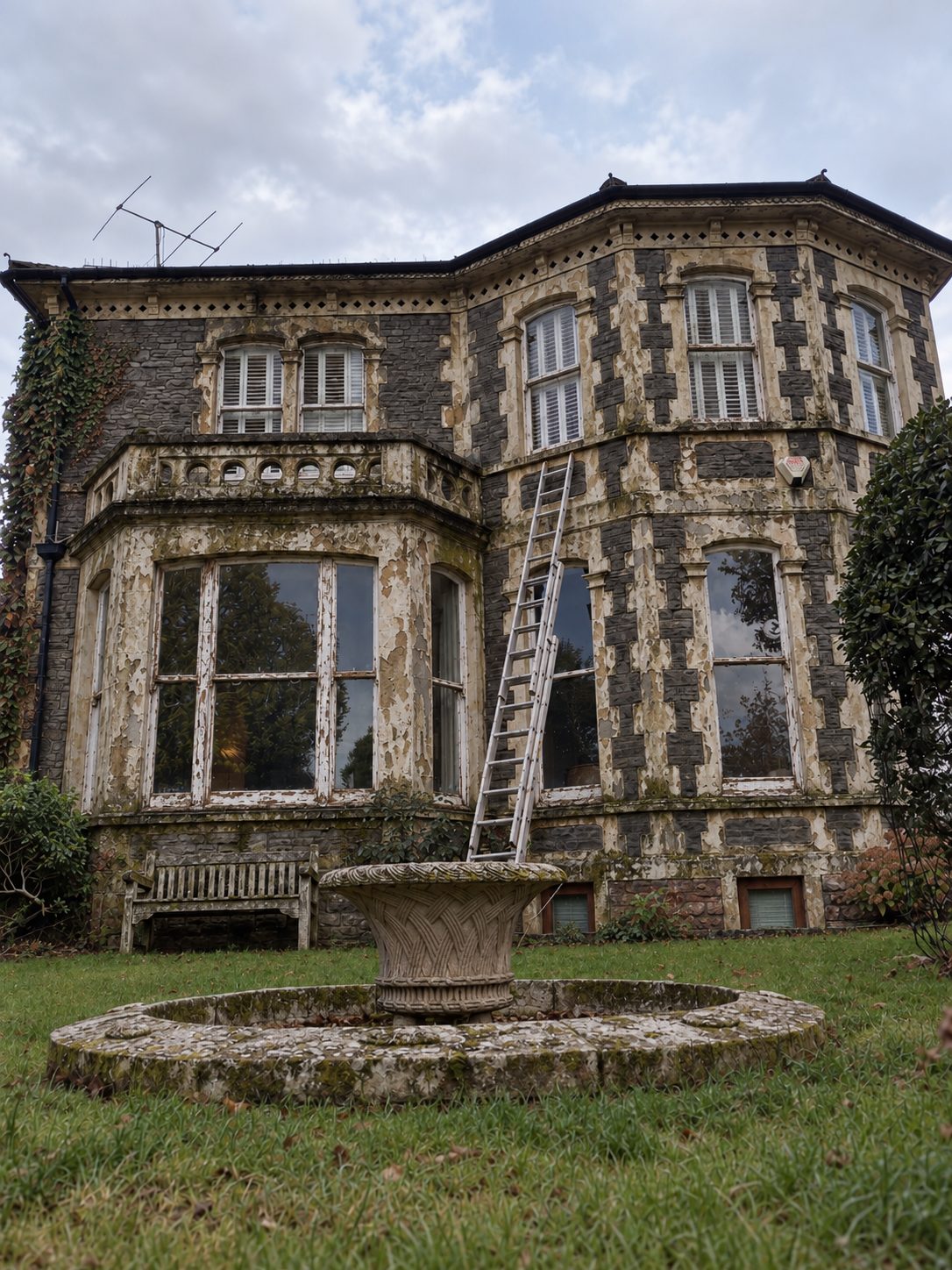 Before: period property exterior with peeling paint